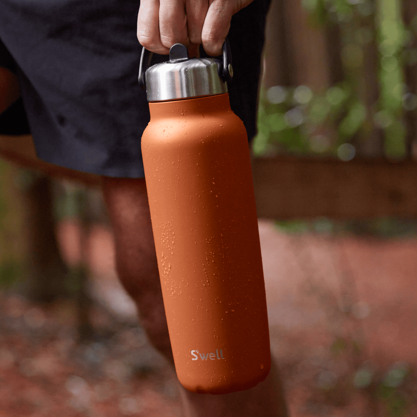 explorer-with-flip-straw-lid-40oz-r3 Swell-Explorer-Water-Bottle-40oz-Orange-Carnelian-LifeStyle.png